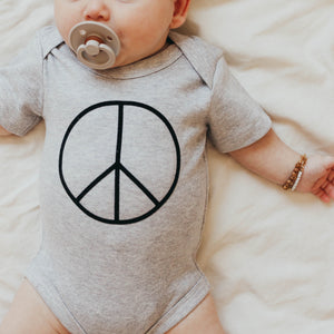
            
                Load image into Gallery viewer, Peace Sign Organic Bodysuit - BohemianBabies
            
        