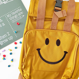
            
                Load image into Gallery viewer, Mustard Smiley Mini Roll-Top Backpack - BohemianBabies
            
        