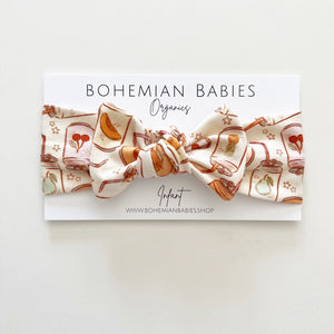 
            
                Load image into Gallery viewer, Fruit Punch Organic Bow Headband - BohemianBabies
            
        